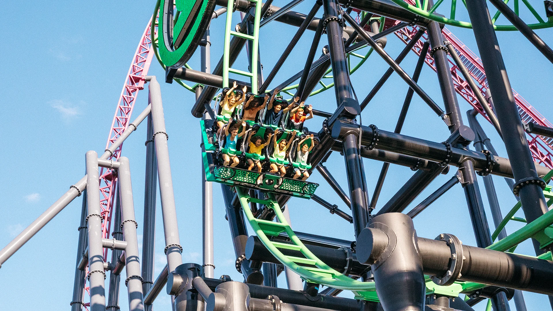Experience the electrifying twists and turns of the Green Lantern attraction at Warner Bros Movie World. This photo captures the excitement of riders soaring through thrilling loops and curves on this iconic coaster.