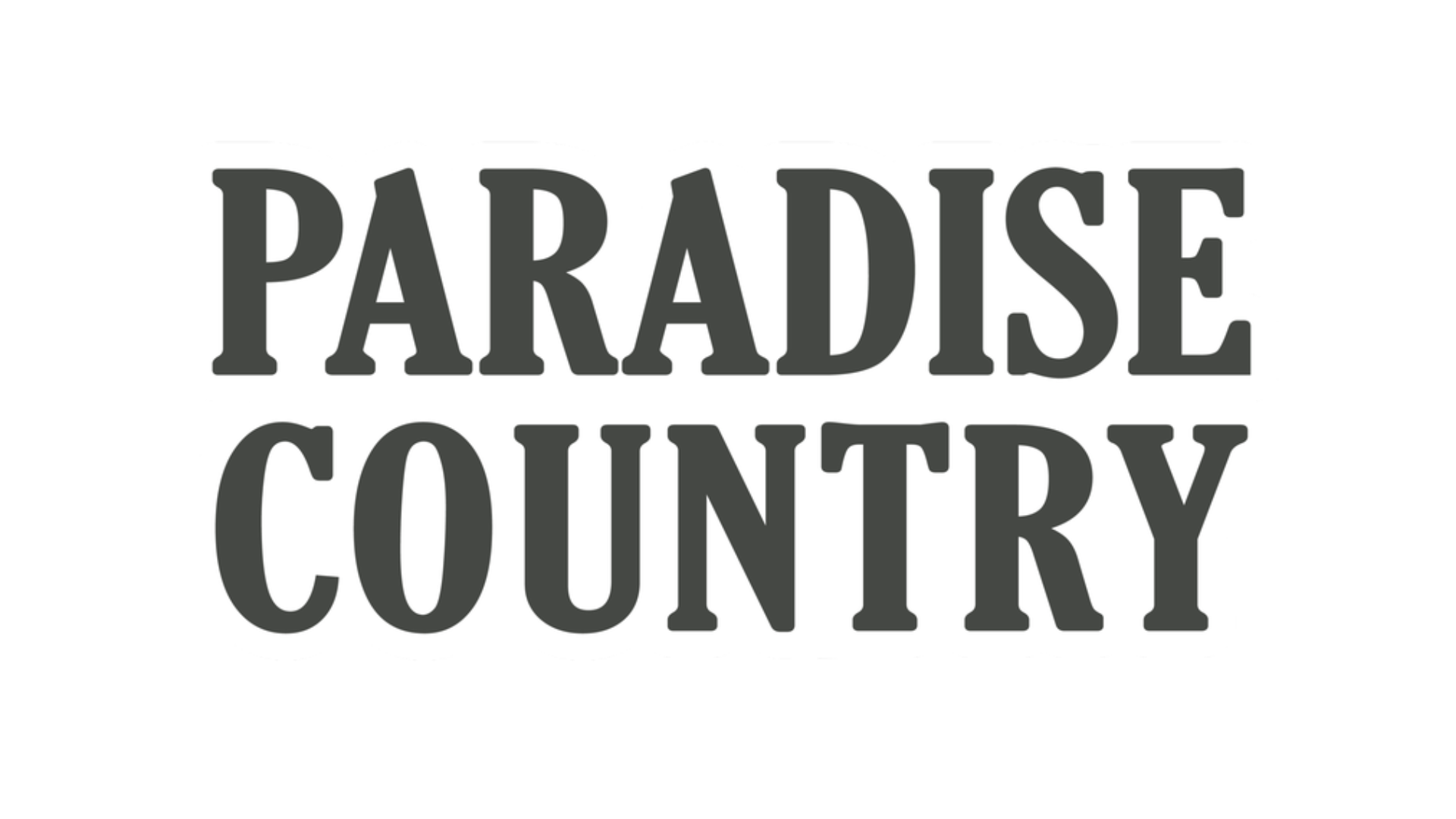 The image features the bold, uppercase words "PARADISE COUNTRY" in black, serif font against a plain white background.