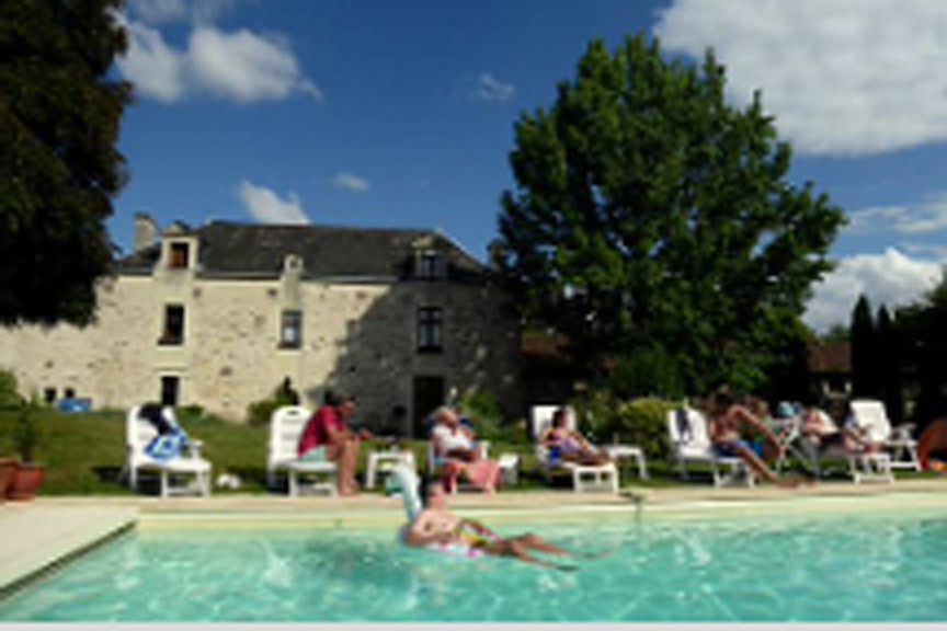 Lazing around the private pool at Manoir Coteaux