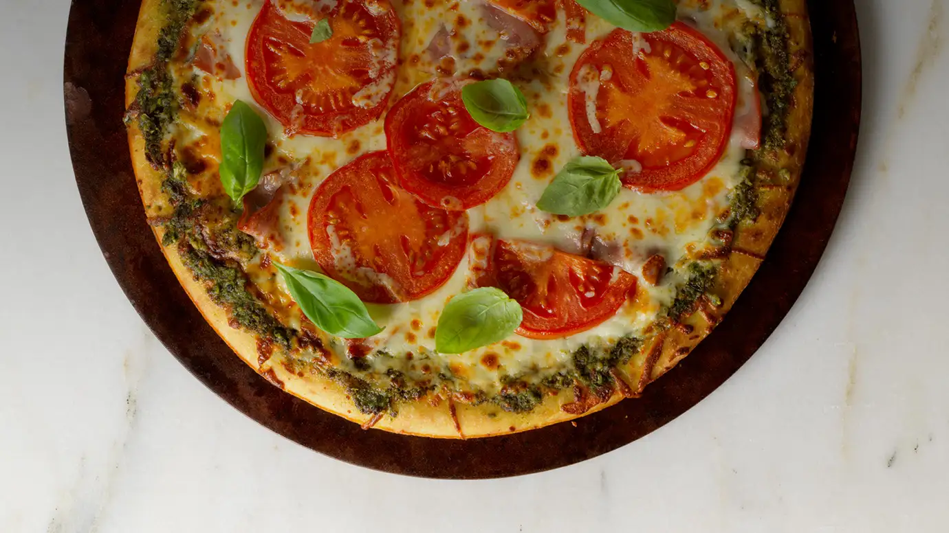 Barilla Rustic Basil Pesto Ham Pizza with Mozzarella Cheese Tomatoes Basil