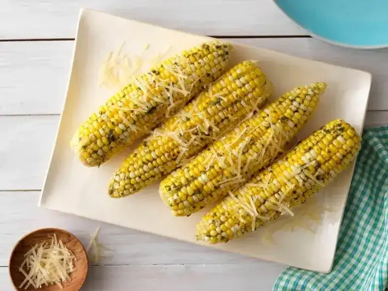 Roasted Corn with Barilla® Rustic Basil Pesto & Parmigiano Cheese