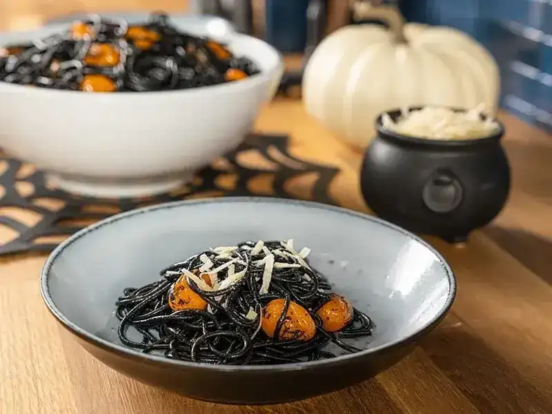 Barilla® Spooky Halloween Pasta with Squid Ink, Orange Grape Tomatoes and Shredded Parmesan Cheese Recipe