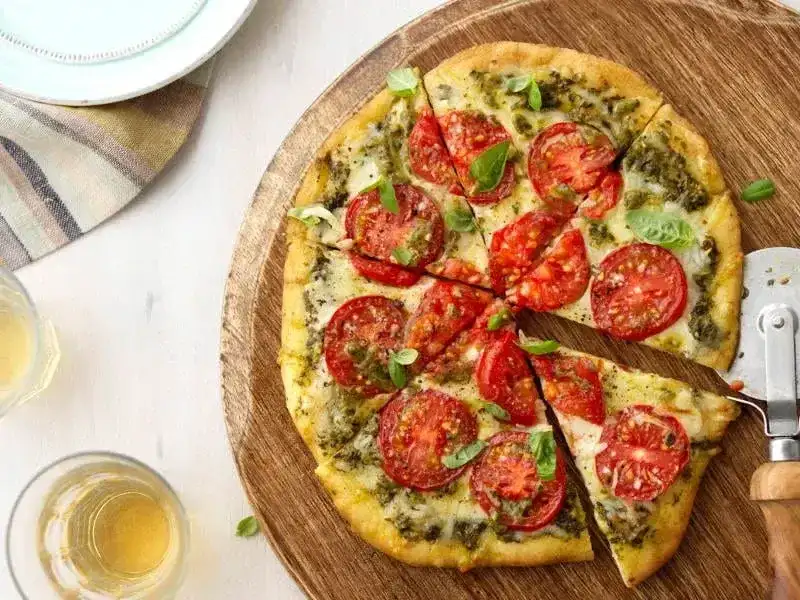 Heirloom Tomato, Mozzarella Cheese & Rustic Basil Pesto Pizza