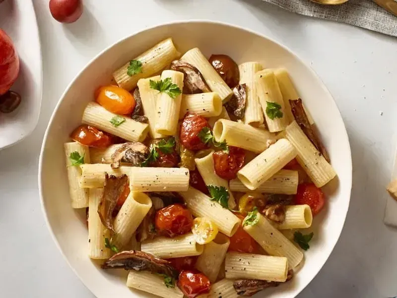 Collezione Rigatoni with Porcini Mushrooms, Shallots, and Tomatoes ...