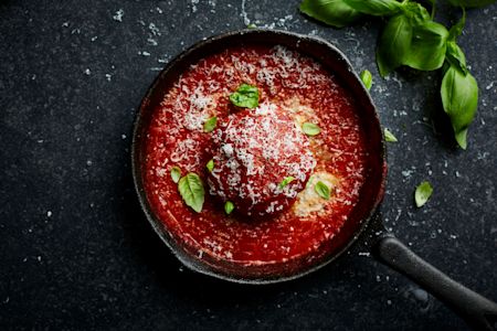 Giant Stuffed Meatball with Tomato Sauce