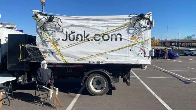 The Junk.com truck sits outside Denver's Trunk or Treat all dressed up for Halloween.