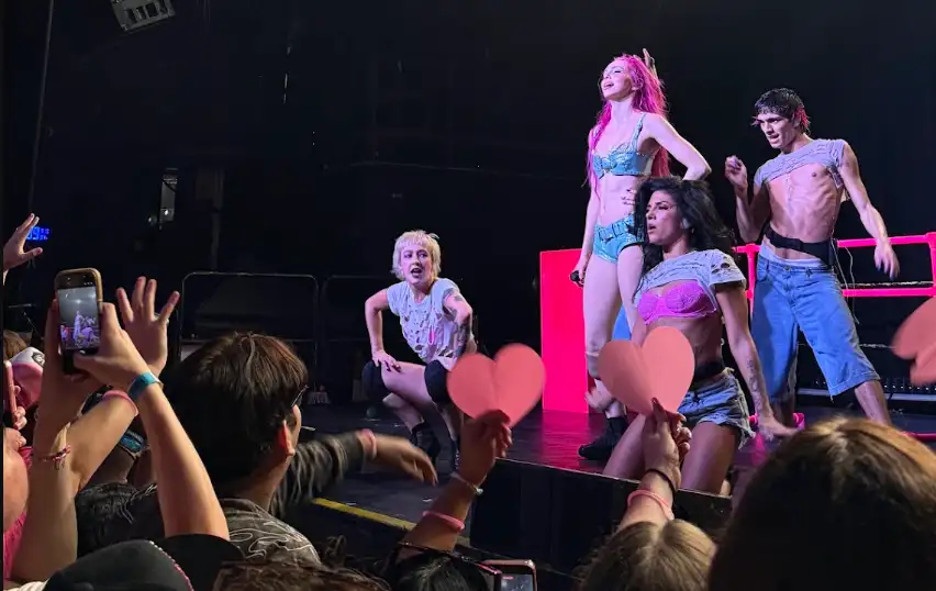 Adela Front Row