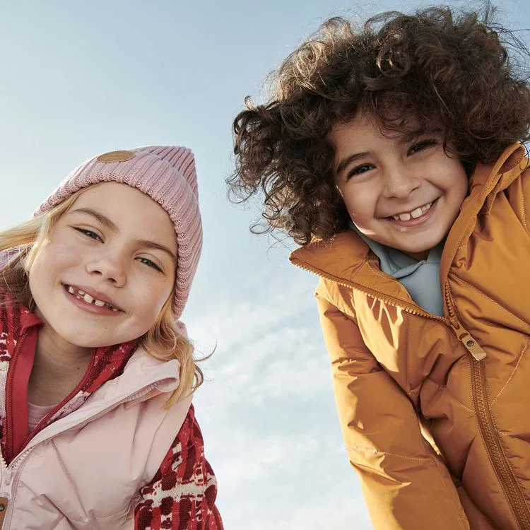 kids-smiling-wearing-reima-coffee-bean jackets