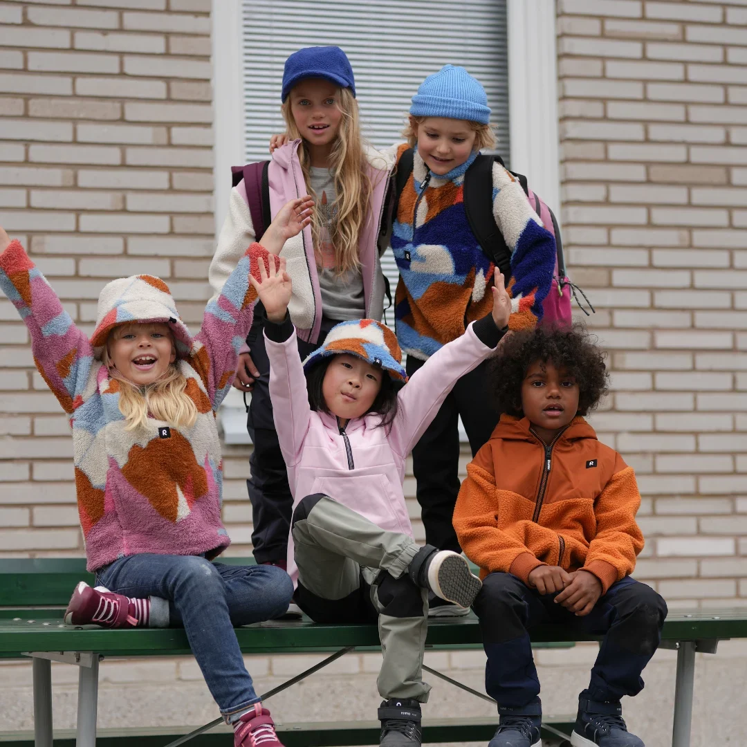 kids-playing-at-school-with-reima-autumn-jackets-outerwear.jpg