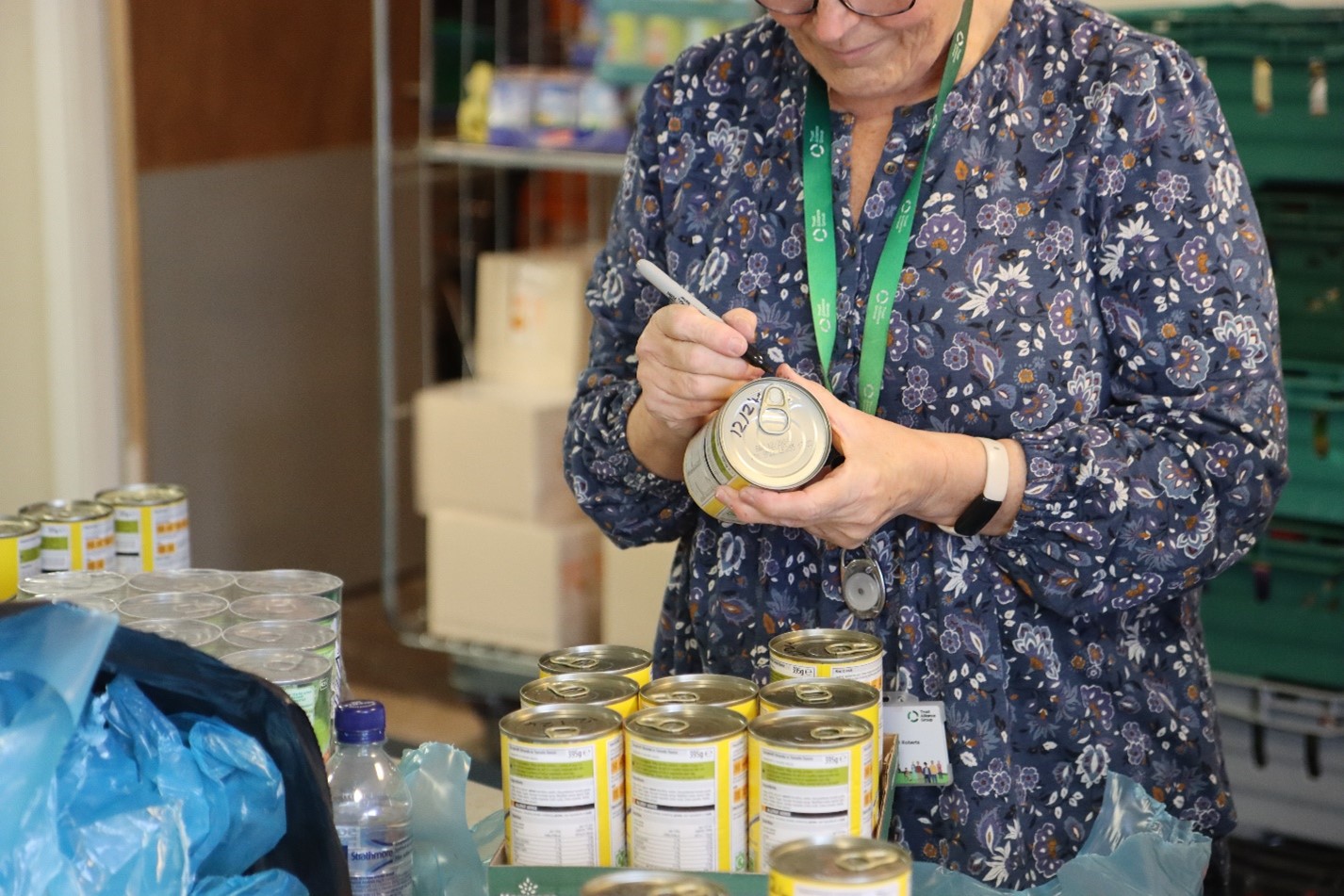 Warrington Foodbank welcomes donations and volunteers from Ombudsman Services over Easter