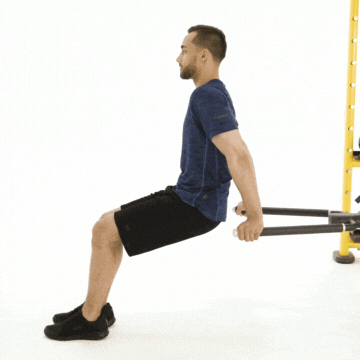 Man in workout clothes performing triceps dip exercise