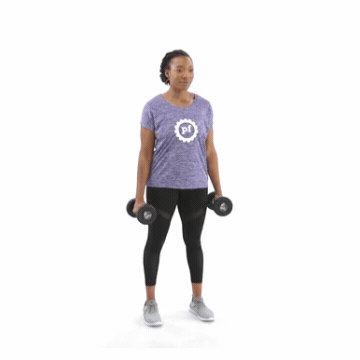 Woman holding dumbbells and performing hammer curl exercise