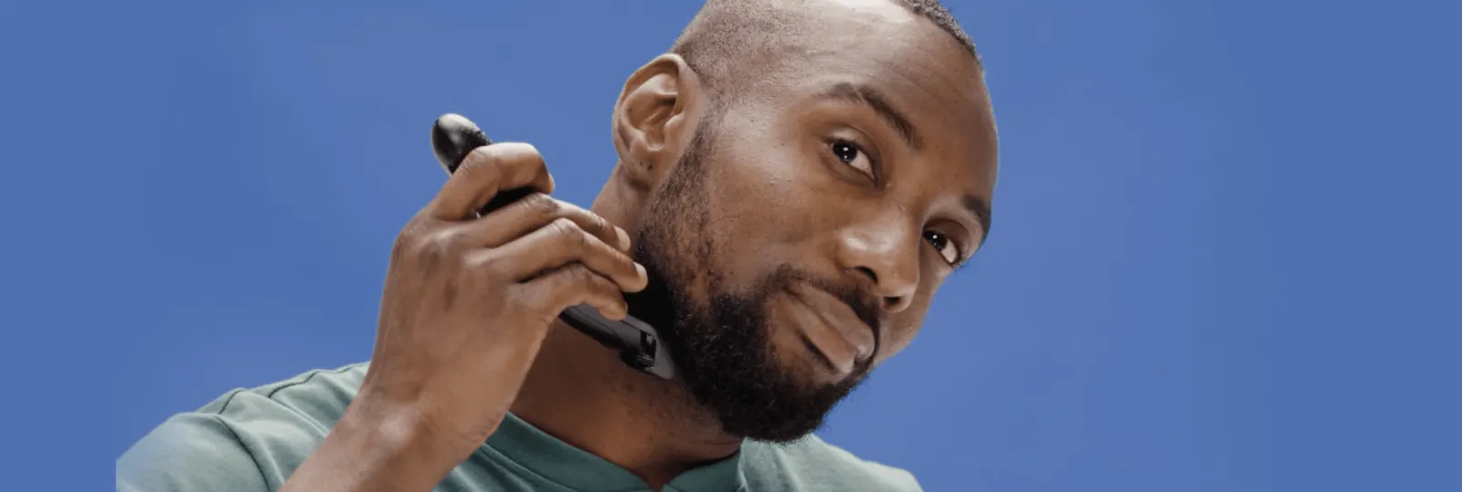 A Man With A Patchy Beard