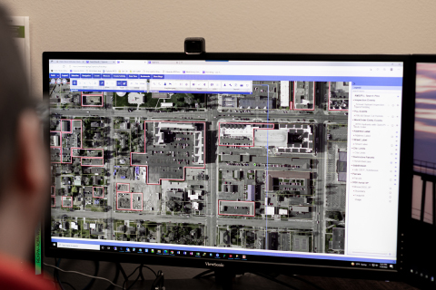 Office worker looking at data collected in the field.