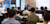 Large group receiving in-person training