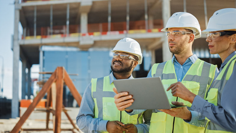 Construction Team with Laptop