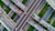An aerial view of a complex highway interchange with multiple intersecting roads and cars.