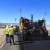 Road workers using Trimble paving solutions