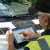 Public asset manager using Cityworks on a tablet