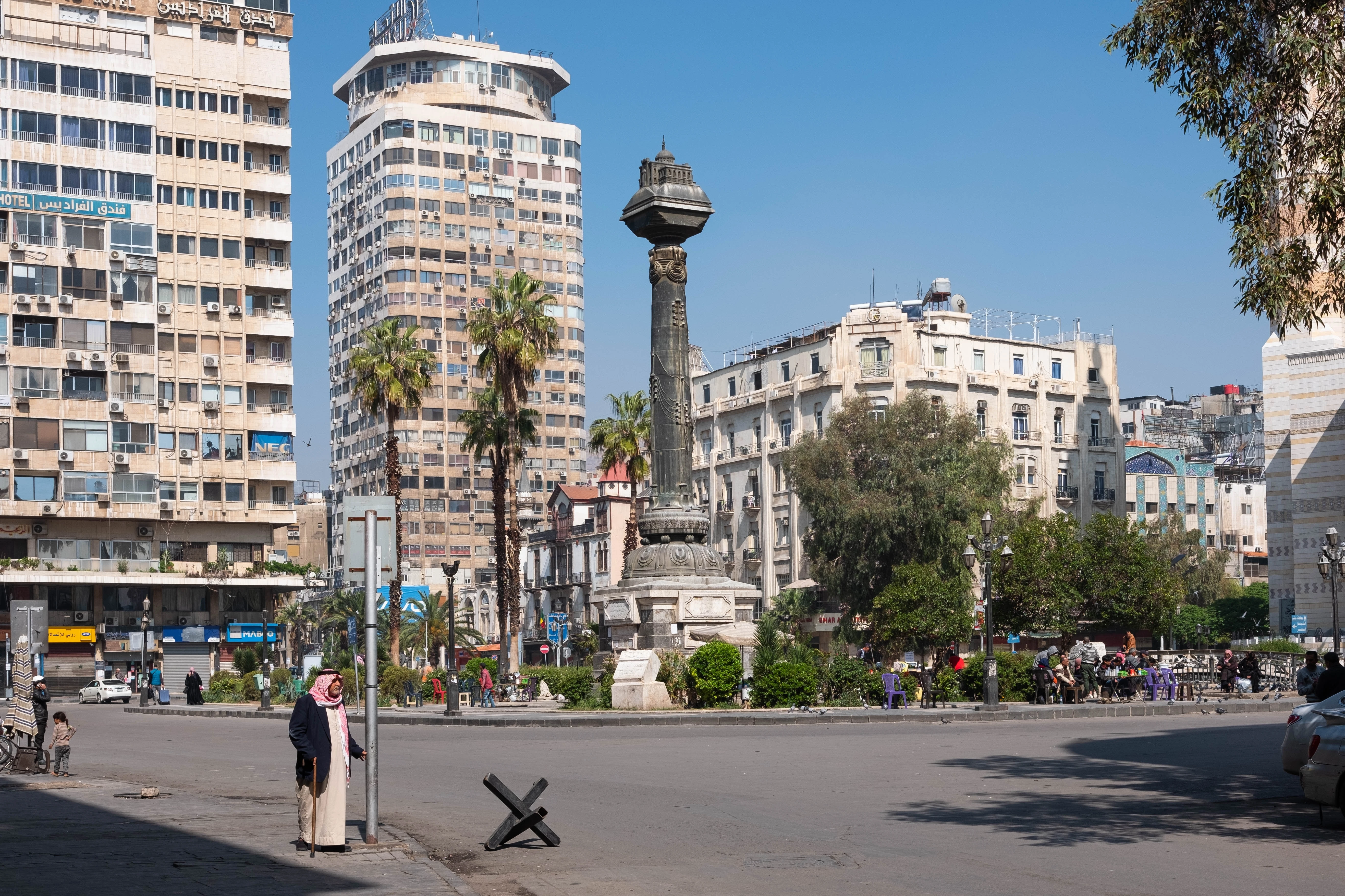 A square with modern buildings in Damascus, Syria