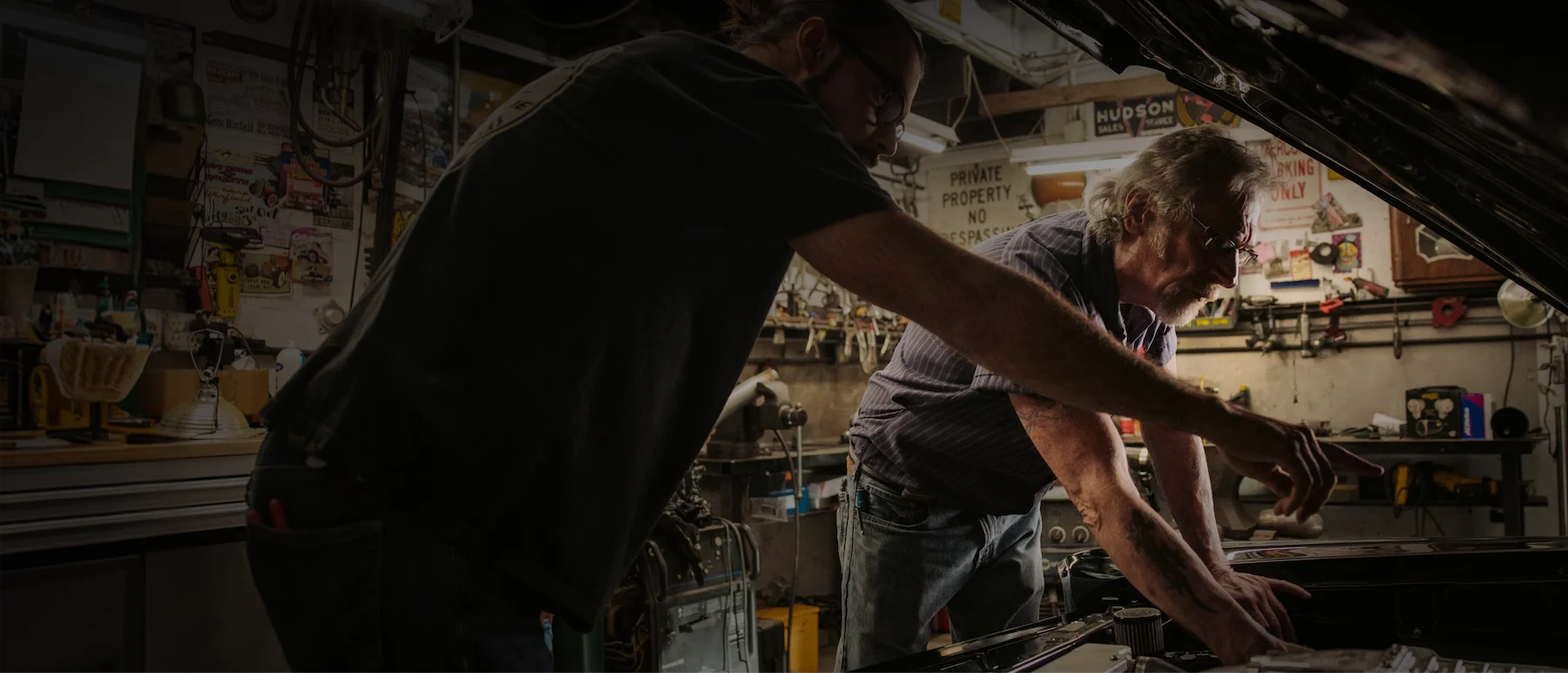men working on a car