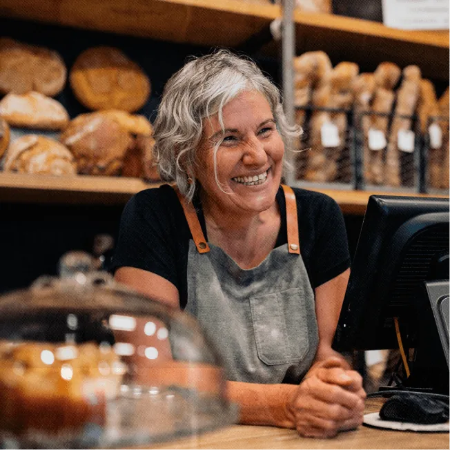 Small business owner smiling
