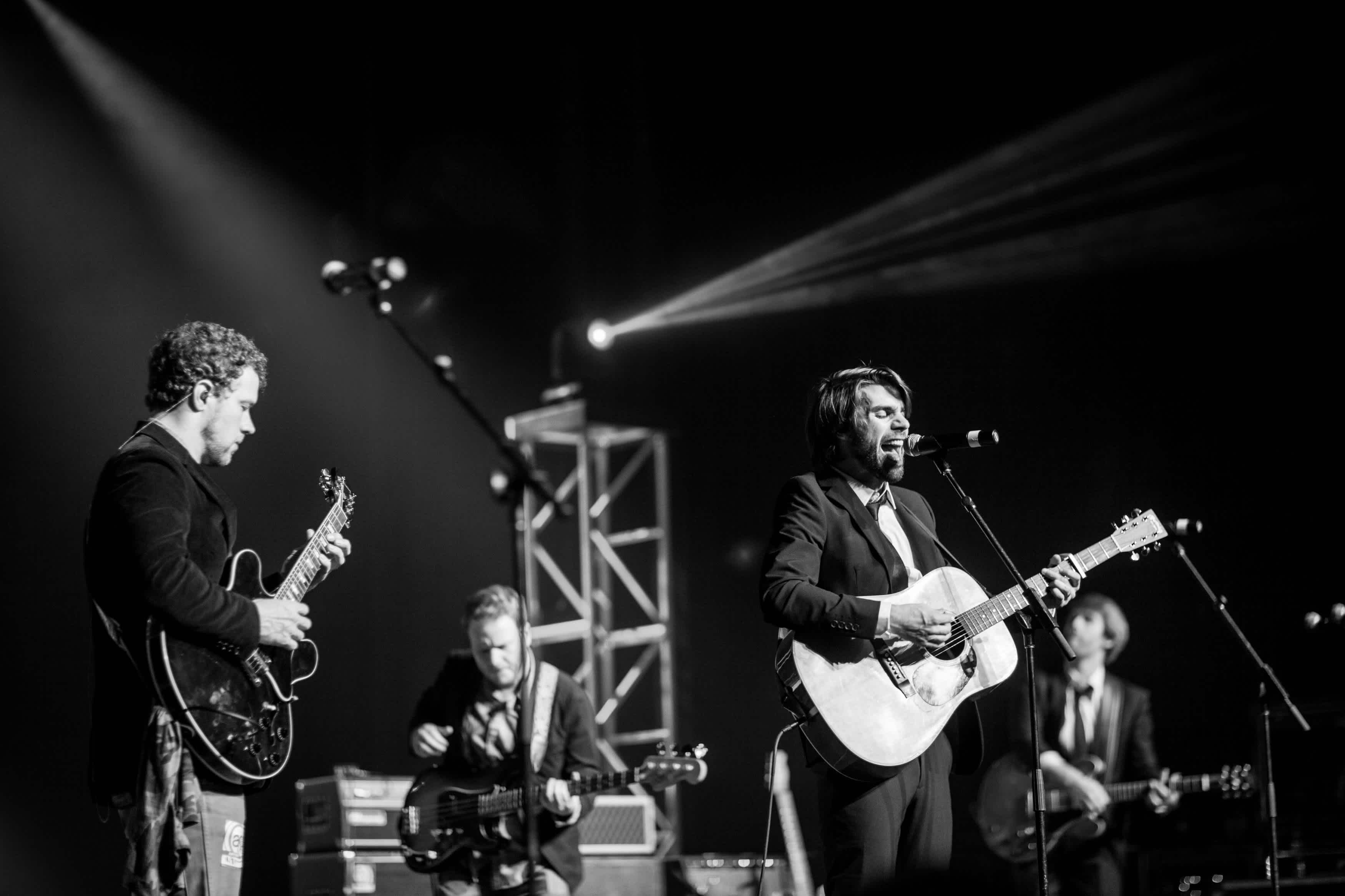 James singing in black and white