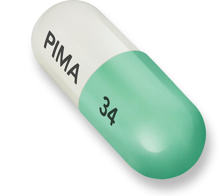 Green and white NUPLAZID® (pimavanserin) 34 mg capsule (does not reflect actual size)