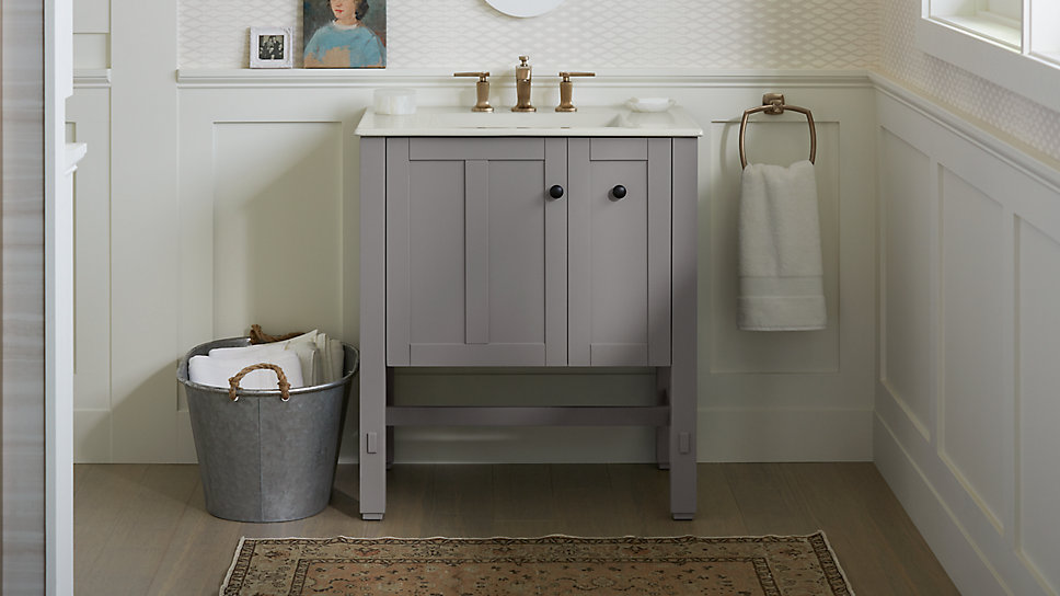 Warm-toned finishes that make a space feel more inviting are becoming more popular in bathroom design.