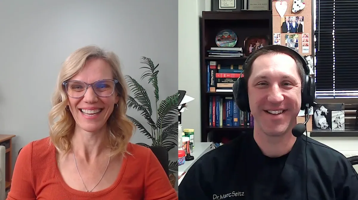 Dr. Alyssa Watson chatting with Dr. Marc Seitz.