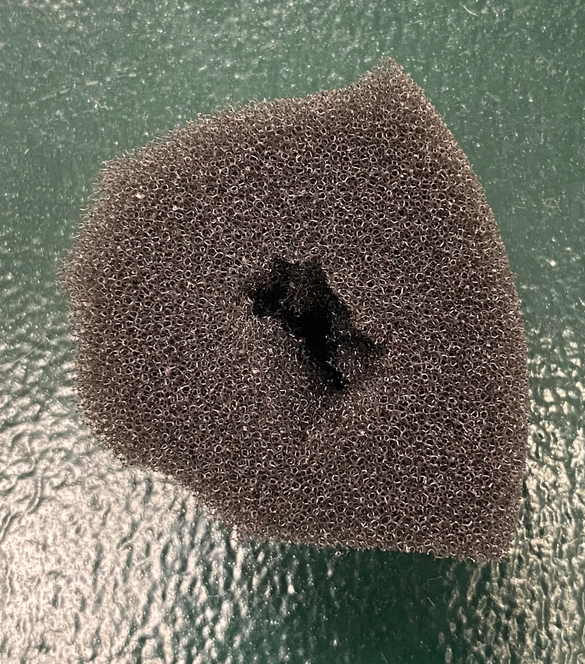 Two examples of donuts used over bony prominences when placing a bandage.