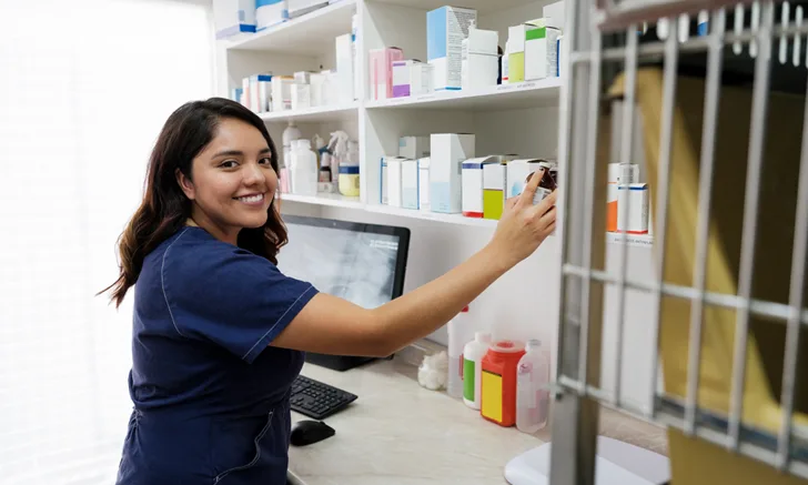 a woman reaches for medication