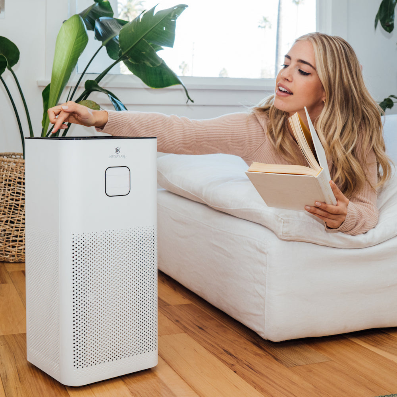 Medify Air White Large MA-50 True HEPA Air Purifier on Floor in Room with Person