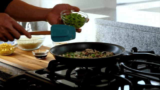 Stir fry all ingredients except almonds and basil over medium heat.