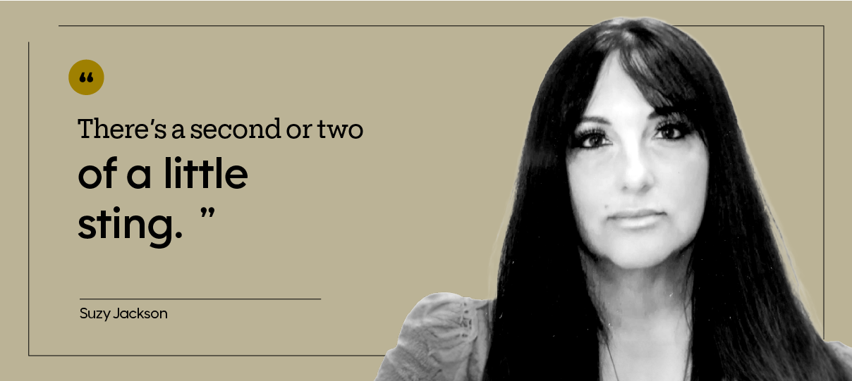 Suzy Jackson is pictured in a headshot.