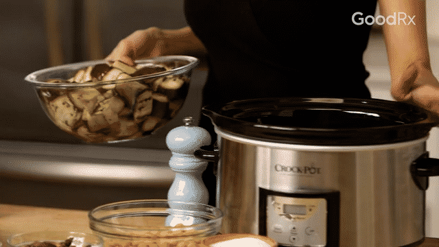 Cut into 1-inch cubes and transfer to a 4-qt (or larger) slow cooker.