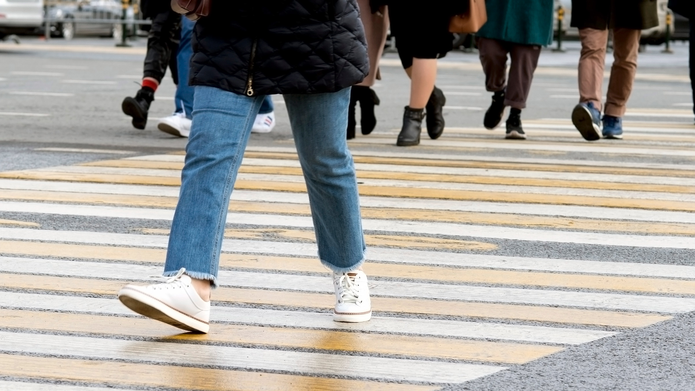 Man In Jeans Walking Across A Zebra Crossing Stock Photo - Download Image  Now - Crosswalk, Zebra Crossing, Crossing - iStock