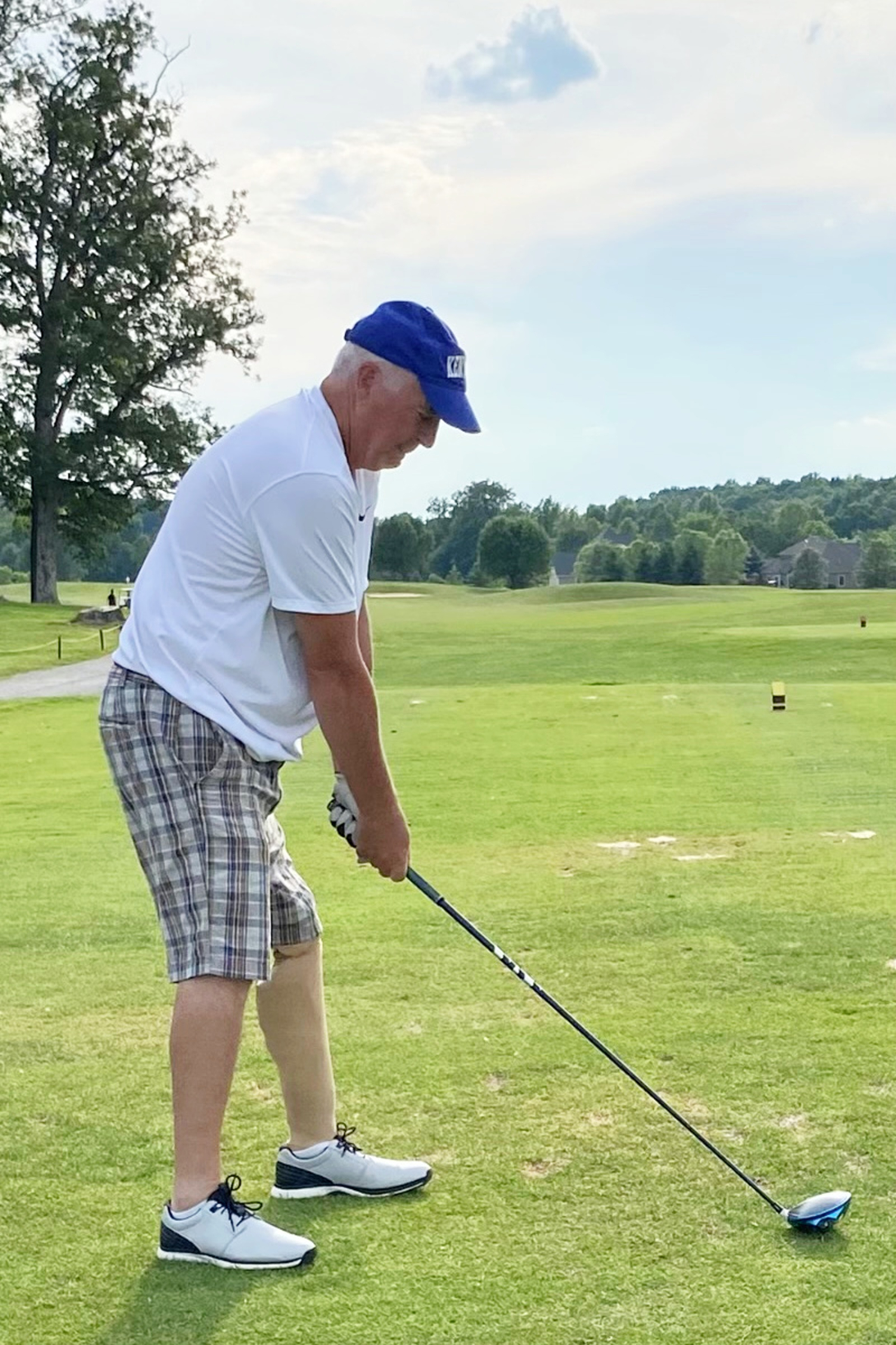 Kevin Shepherd is pictured golfing.