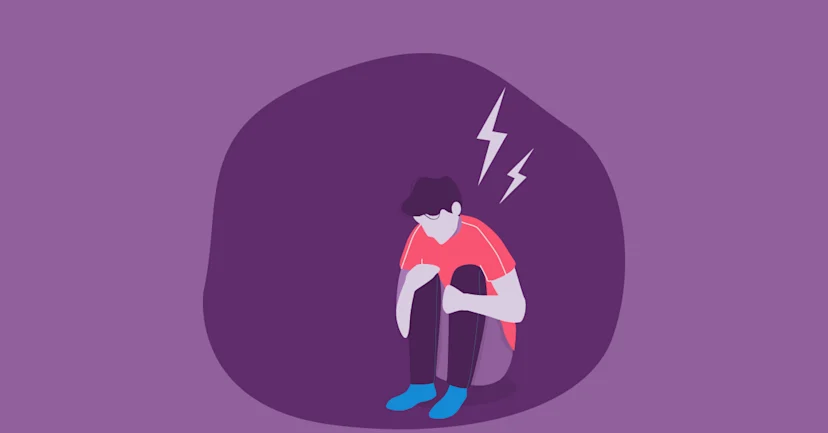 Illustration of a man hunched over having an anxiety attack