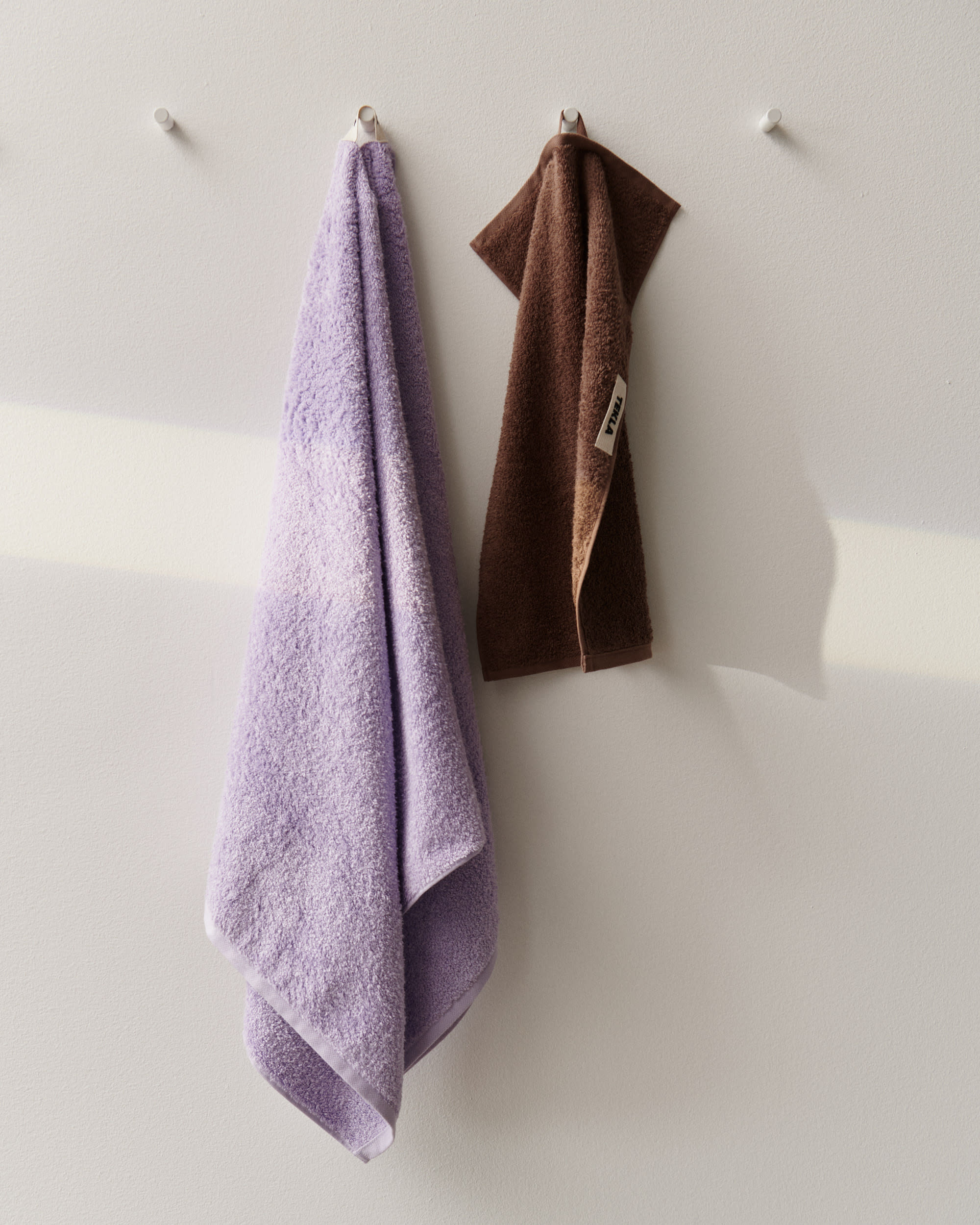 Lavender paired with Kodiak Brown towels