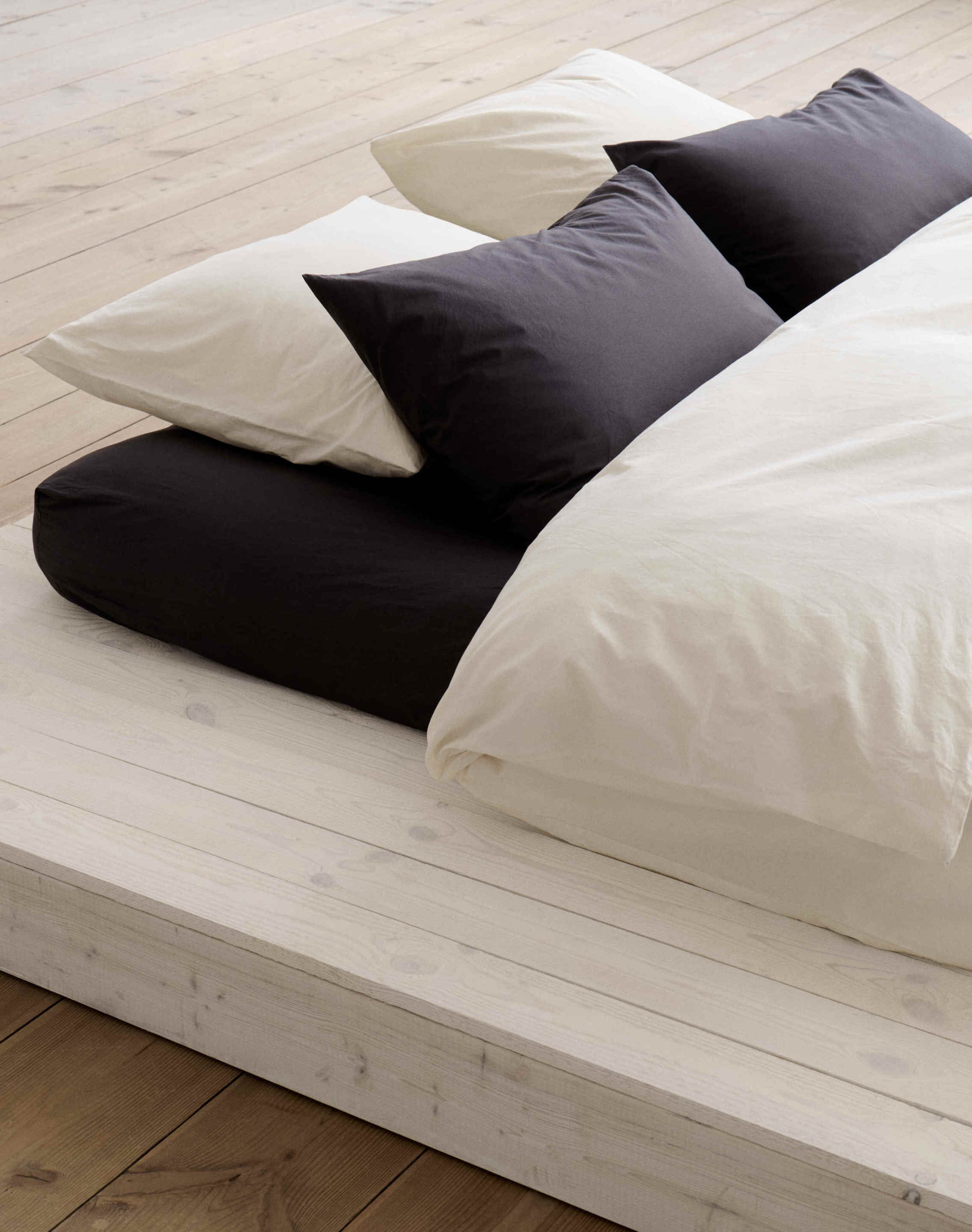 Ash Black paired with Winter White bedding