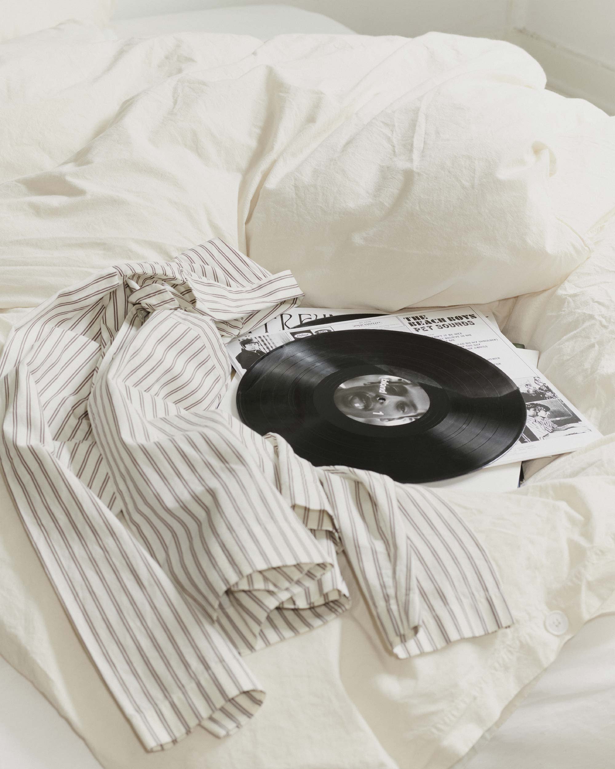 Hopper Stripes long-sleeved shirt on Broken White bedding