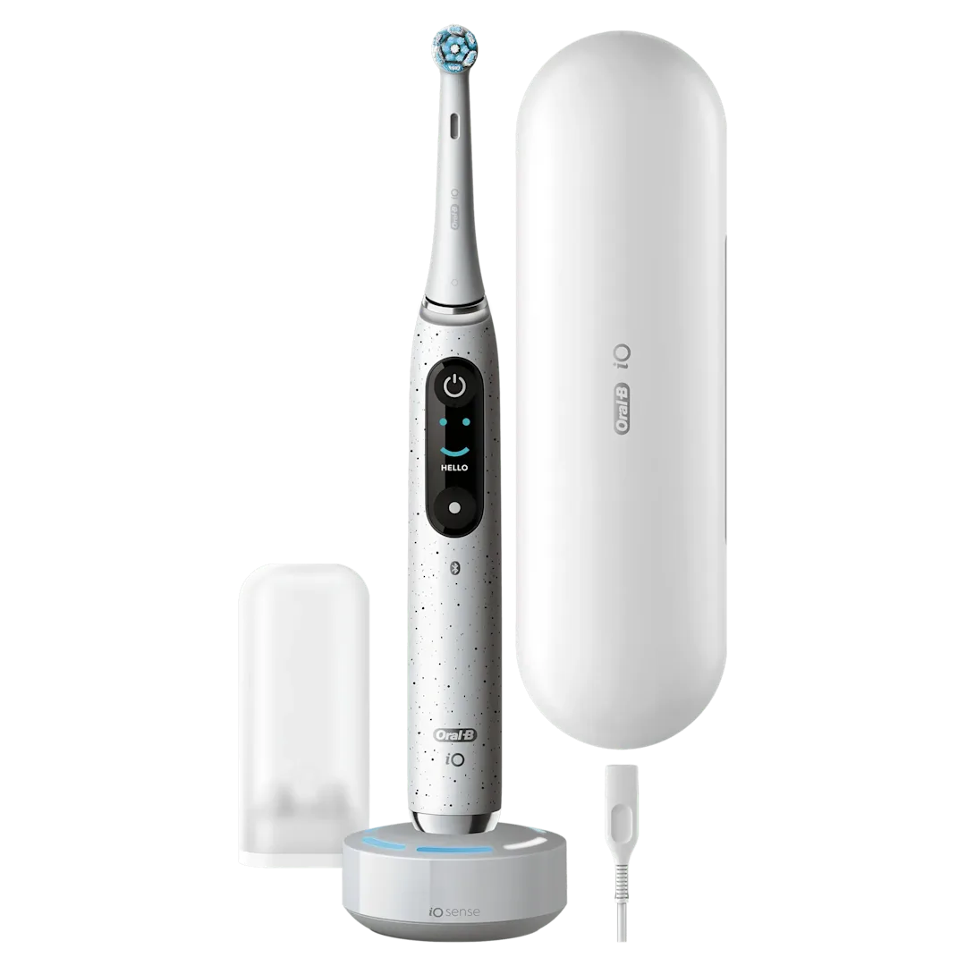 Oral-B iO 10 Ultimate color blanco, destacando Lo mejor de Oral-B destacado. Se ve la base carga, estuche de carga y soporte para cabezales.