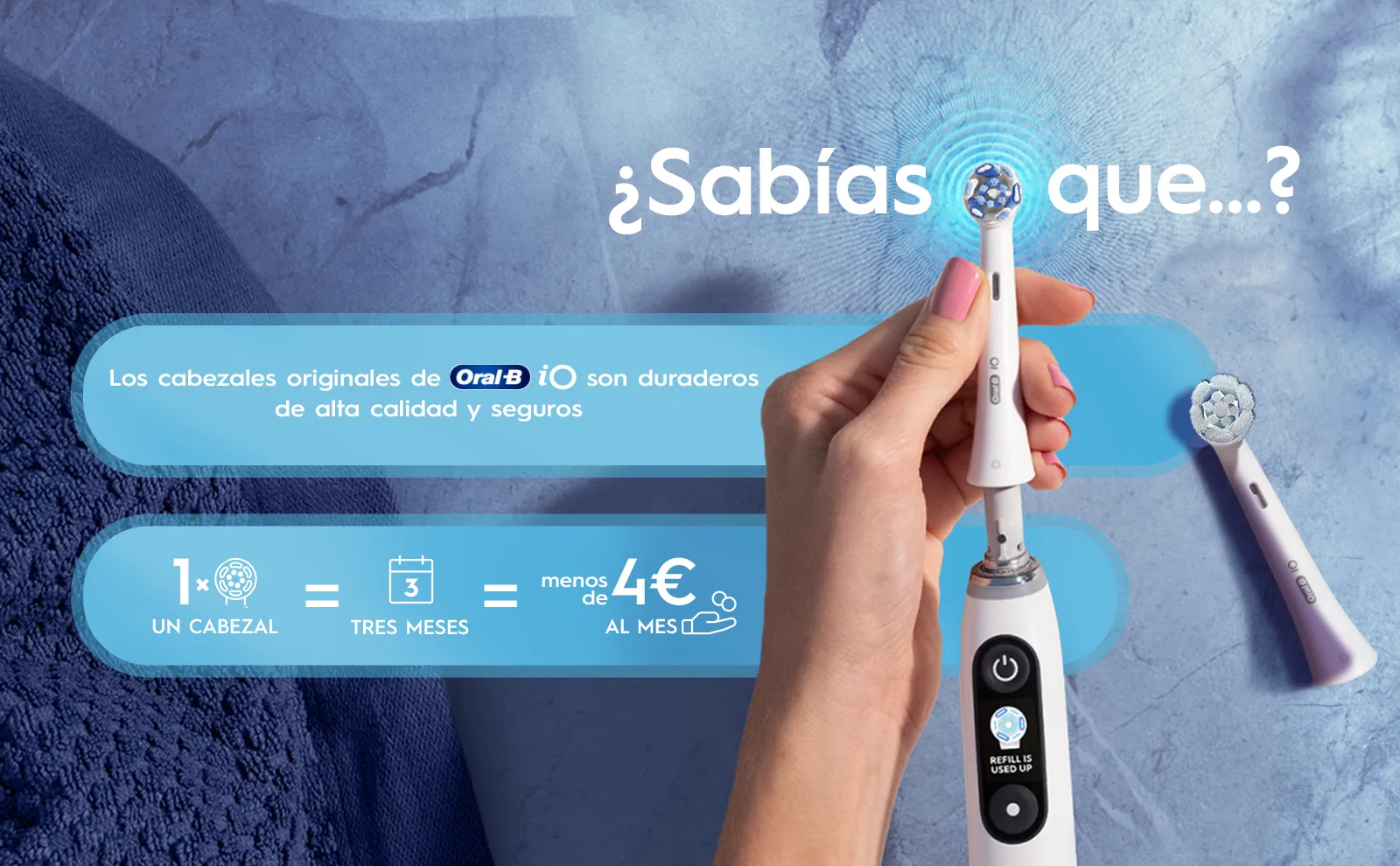Mano sujetando el cabezal Oral-B iO que dura 3 meses, por lo que cuesta menos de 4 € al mes.