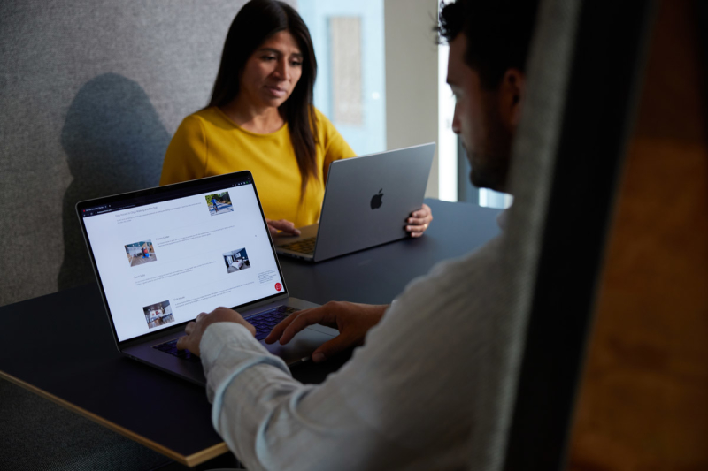 two people working on computer