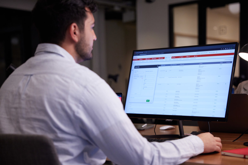 Man sitting in front of a computer