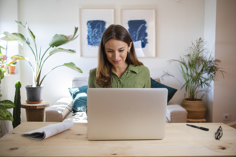 Webinars header image – woman looking at computer 