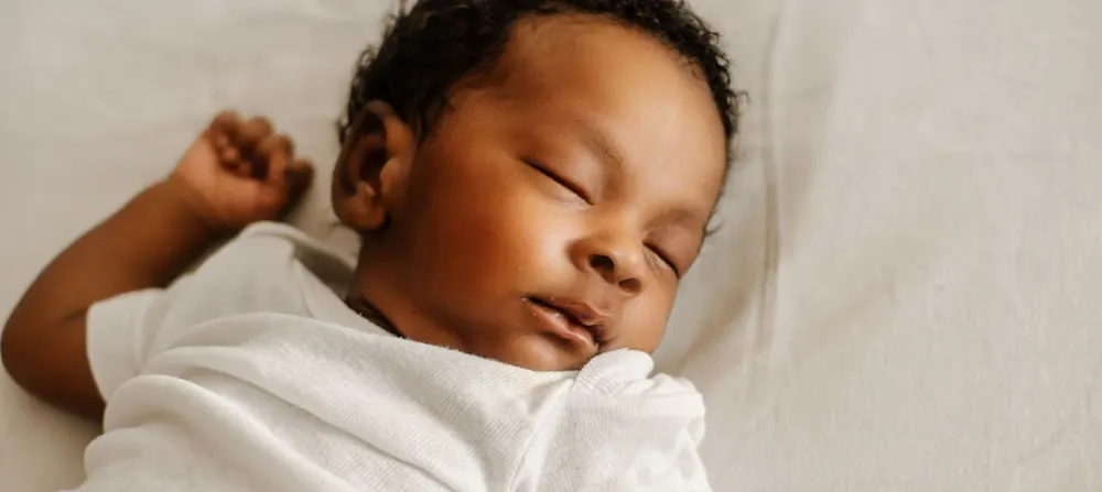 A baby sleeping.