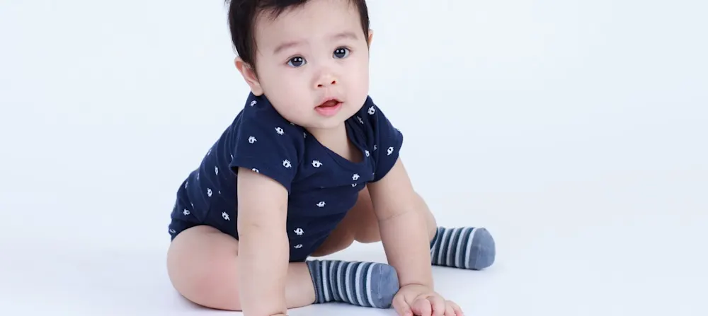 A baby sitting up.
