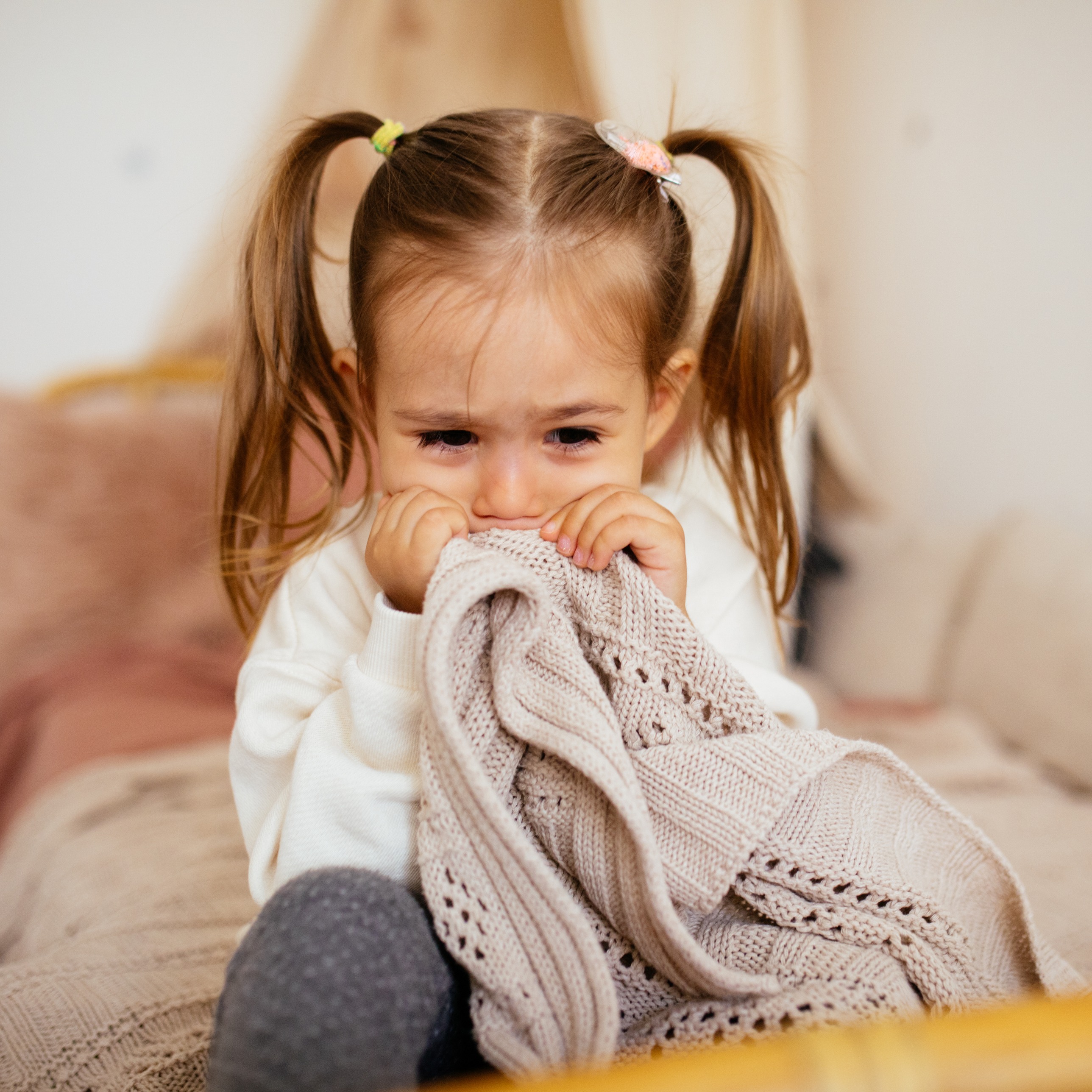 Little girl scared in bed. 